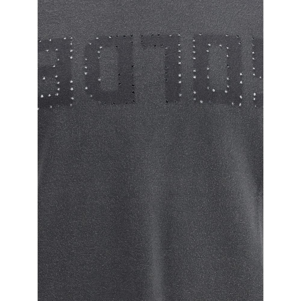 A close-up view of a garment with embroidered text