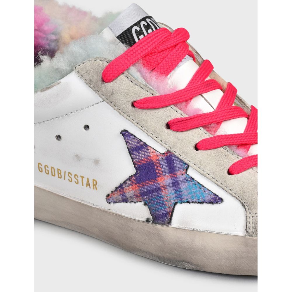 "Golden Goose white leather sneakers with gold buckle and distressed details"