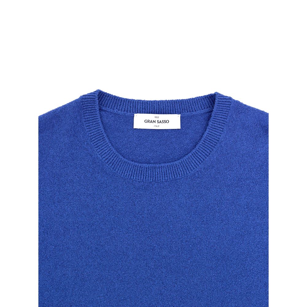 Blue crew neck sweater on hanger