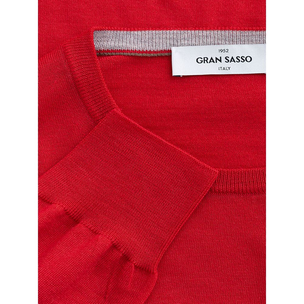 Red sweater on hanger