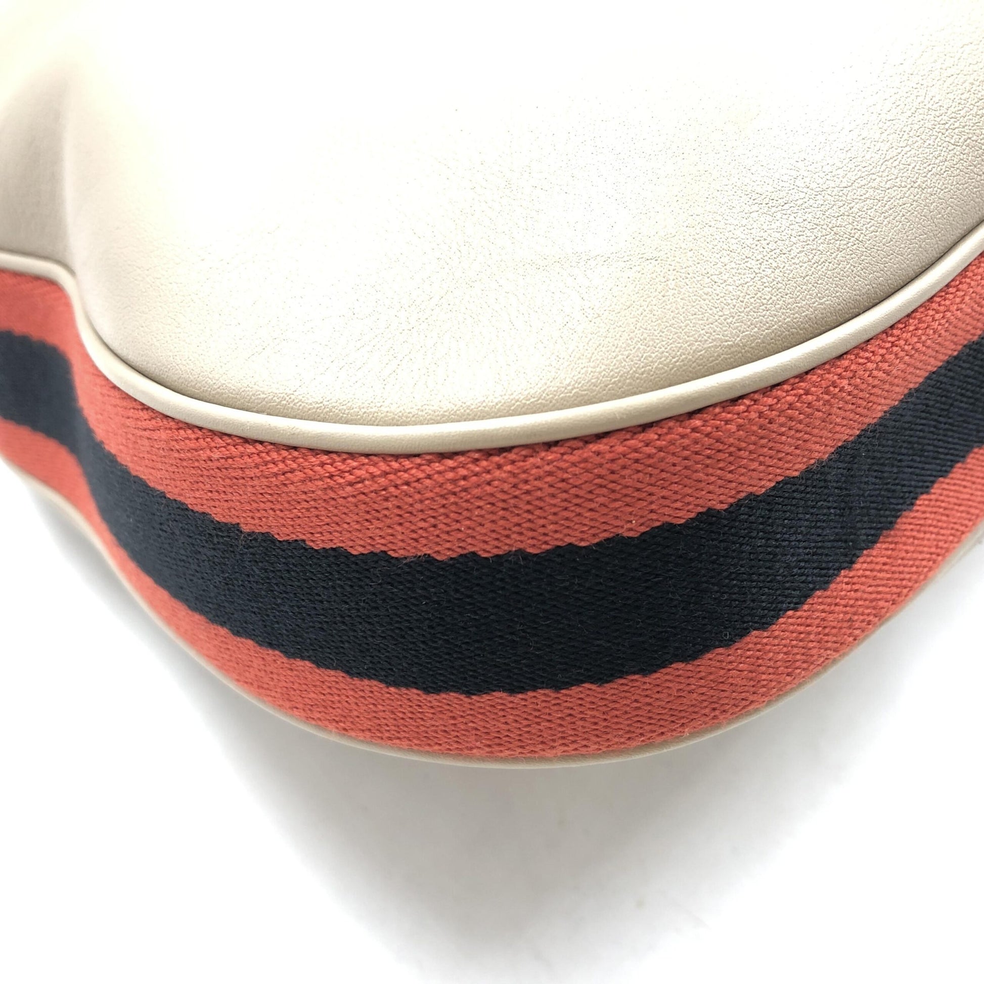 Striped fabric on edge of bag