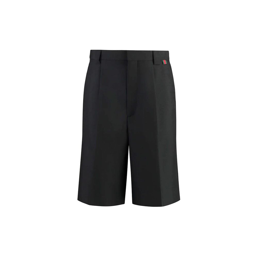 Black shorts with a small red logo on the left side