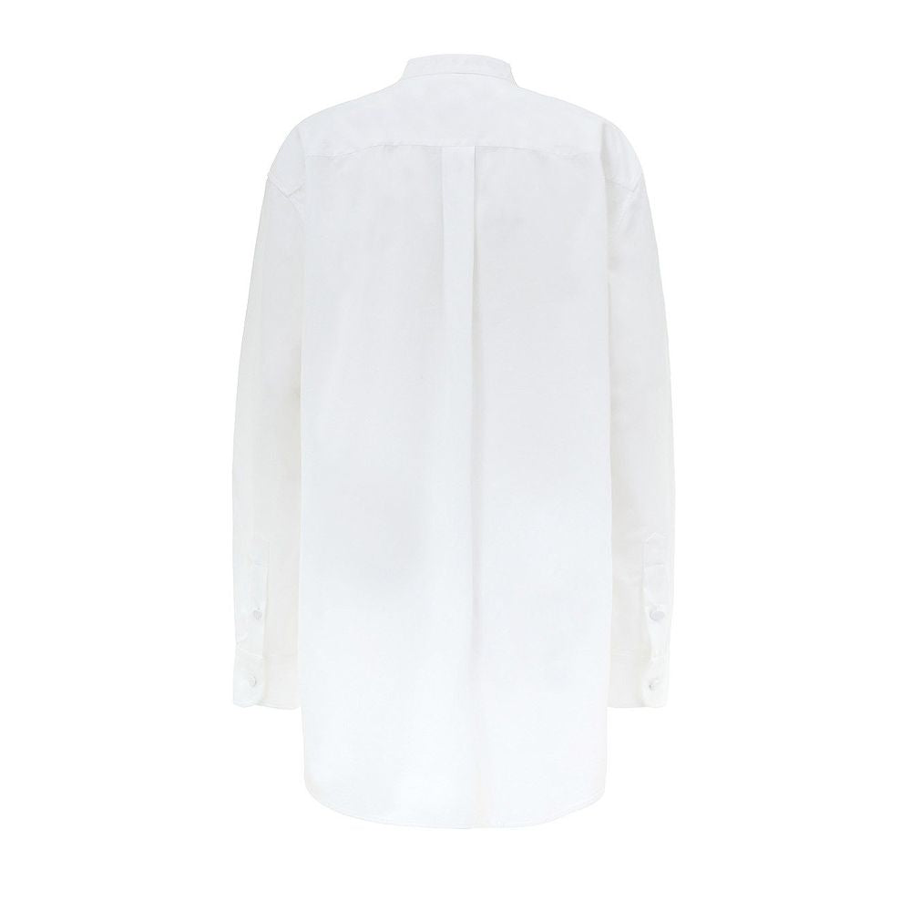 White long sleeve shirt on hanger