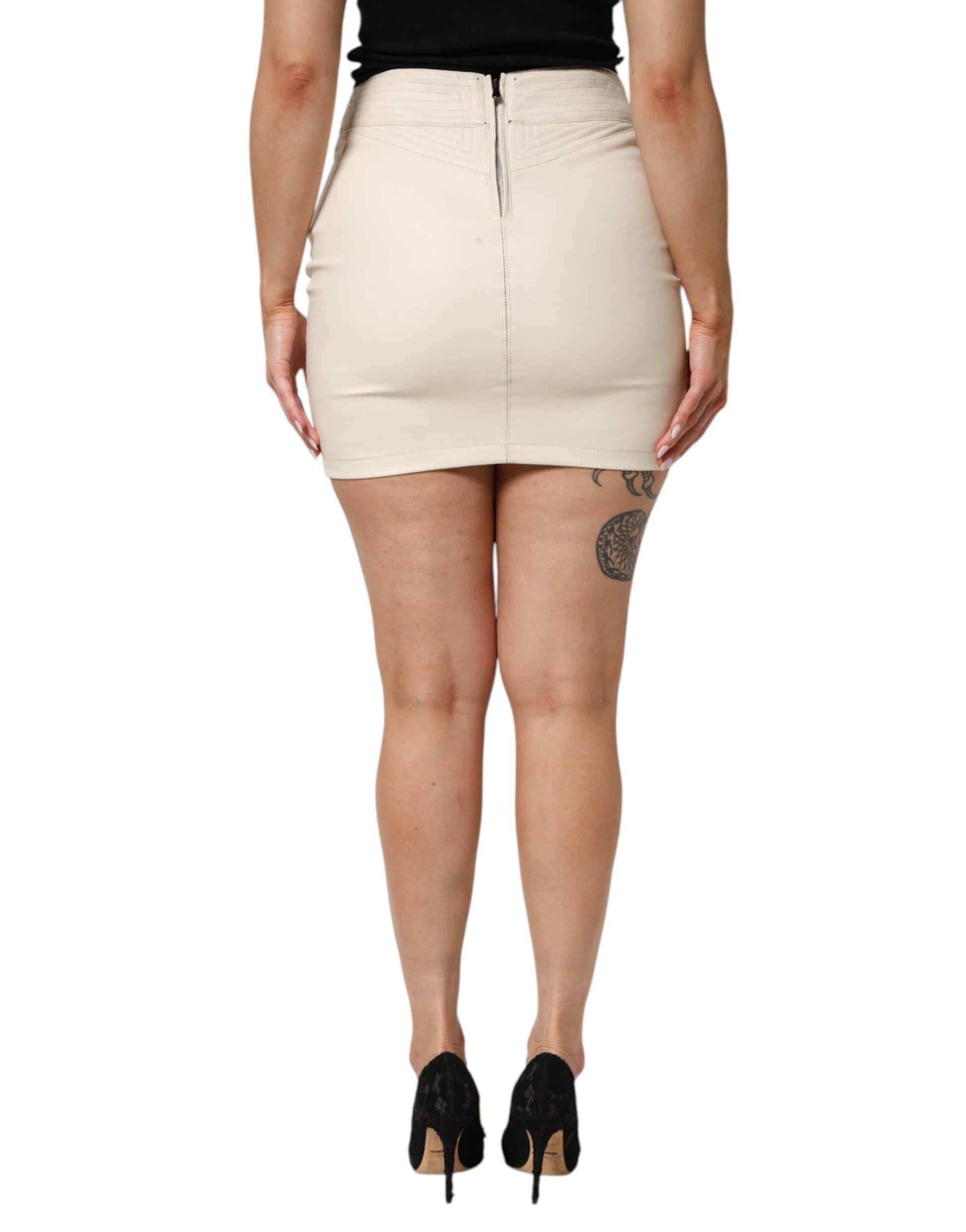 Woman wearing short skirt and black heels
