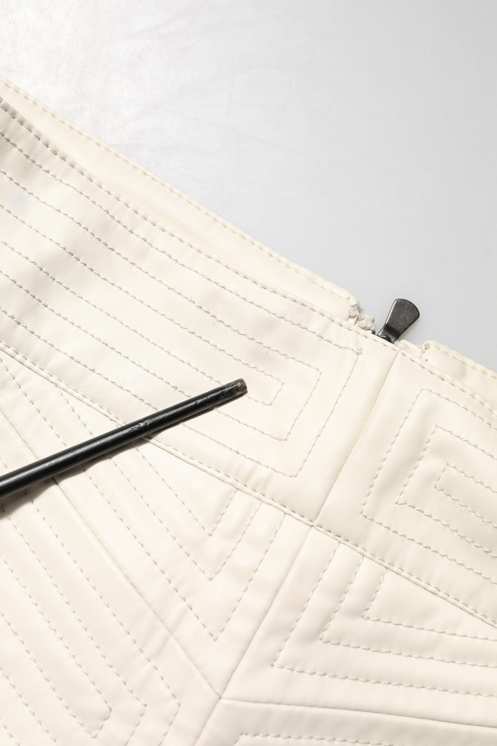 Handmade quilted blanket with visible stitching