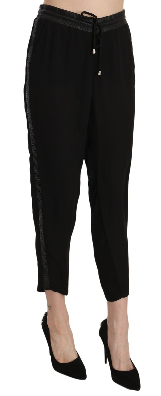 Pair of black pants with zipper detail on legs