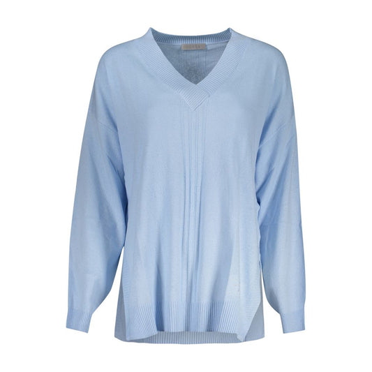 Long sleeve blue sweater on hanger