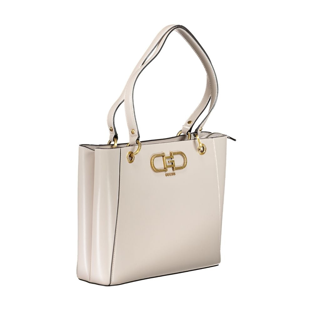 A light pink handbag with a metallic clasp