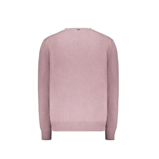 Pink sweater on hanger