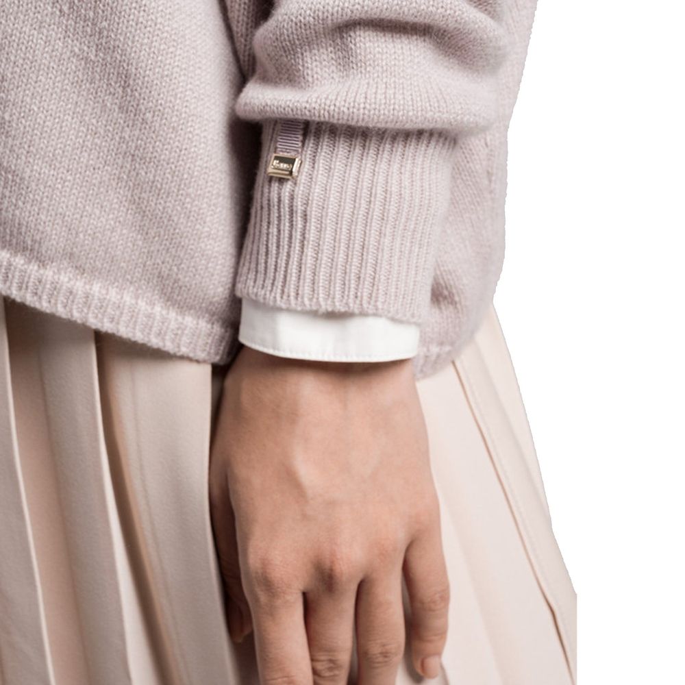 Pink sweater with white cuffs