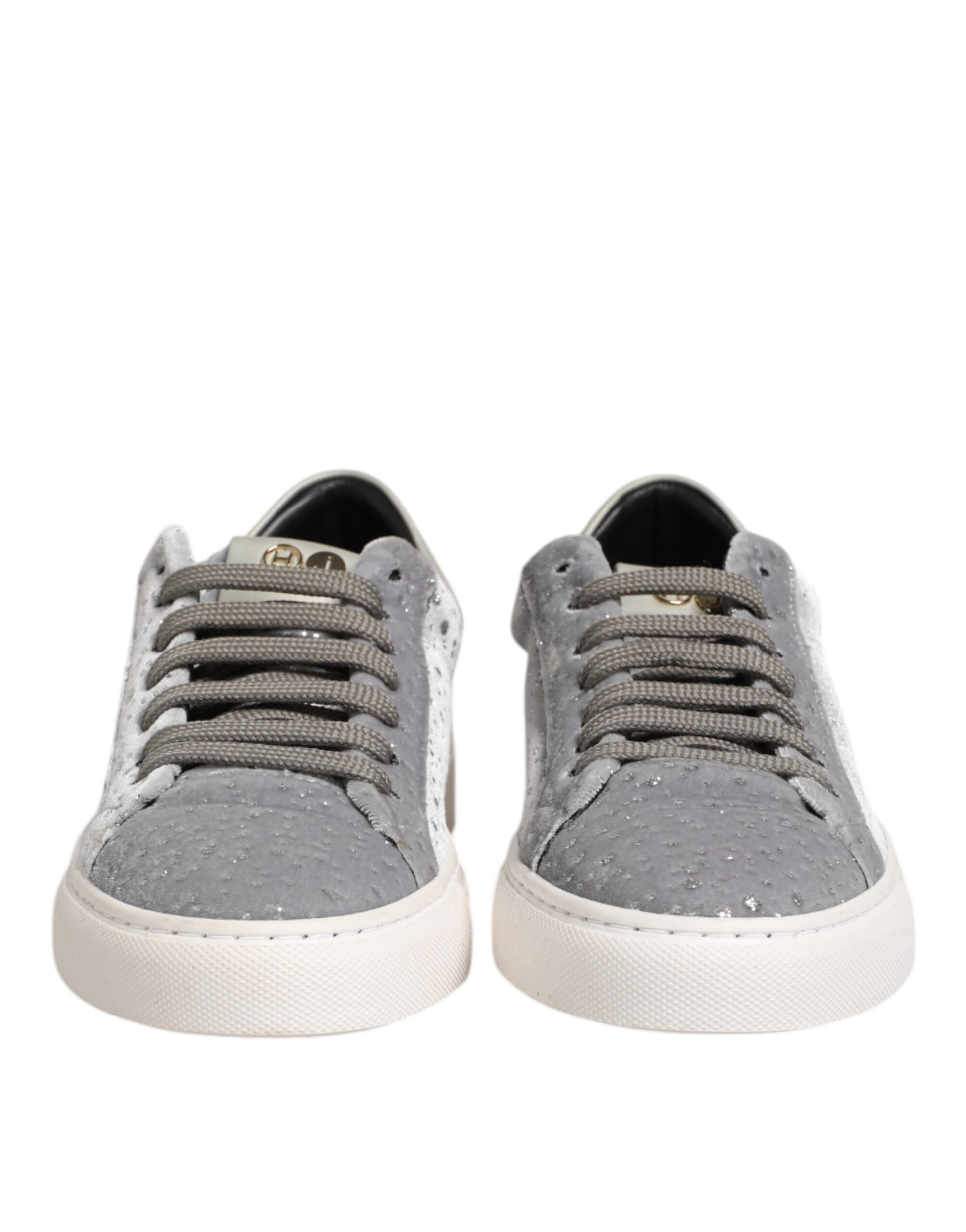 Pair of gray sneakers with white soles