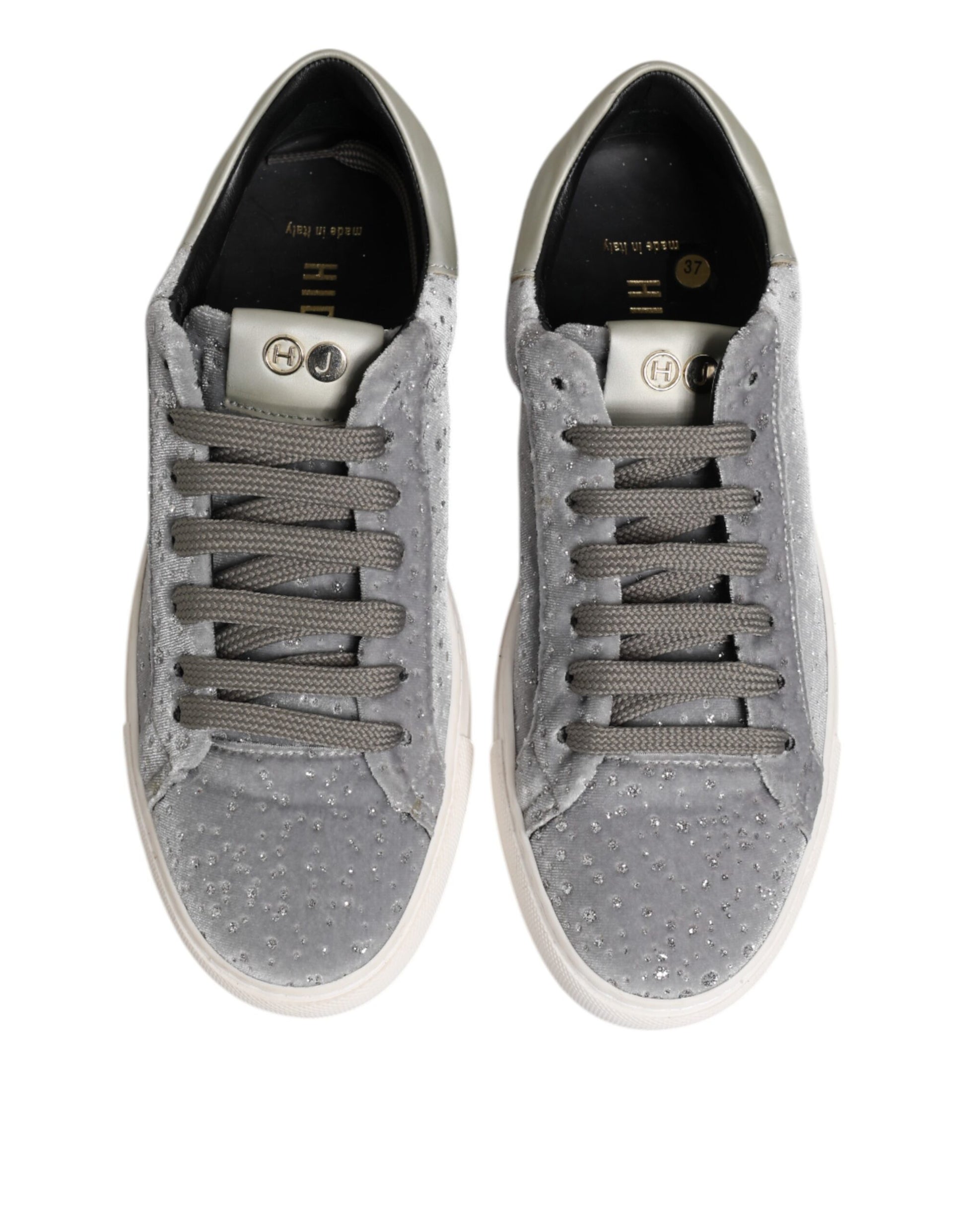 Pair of gray sneakers with white soles