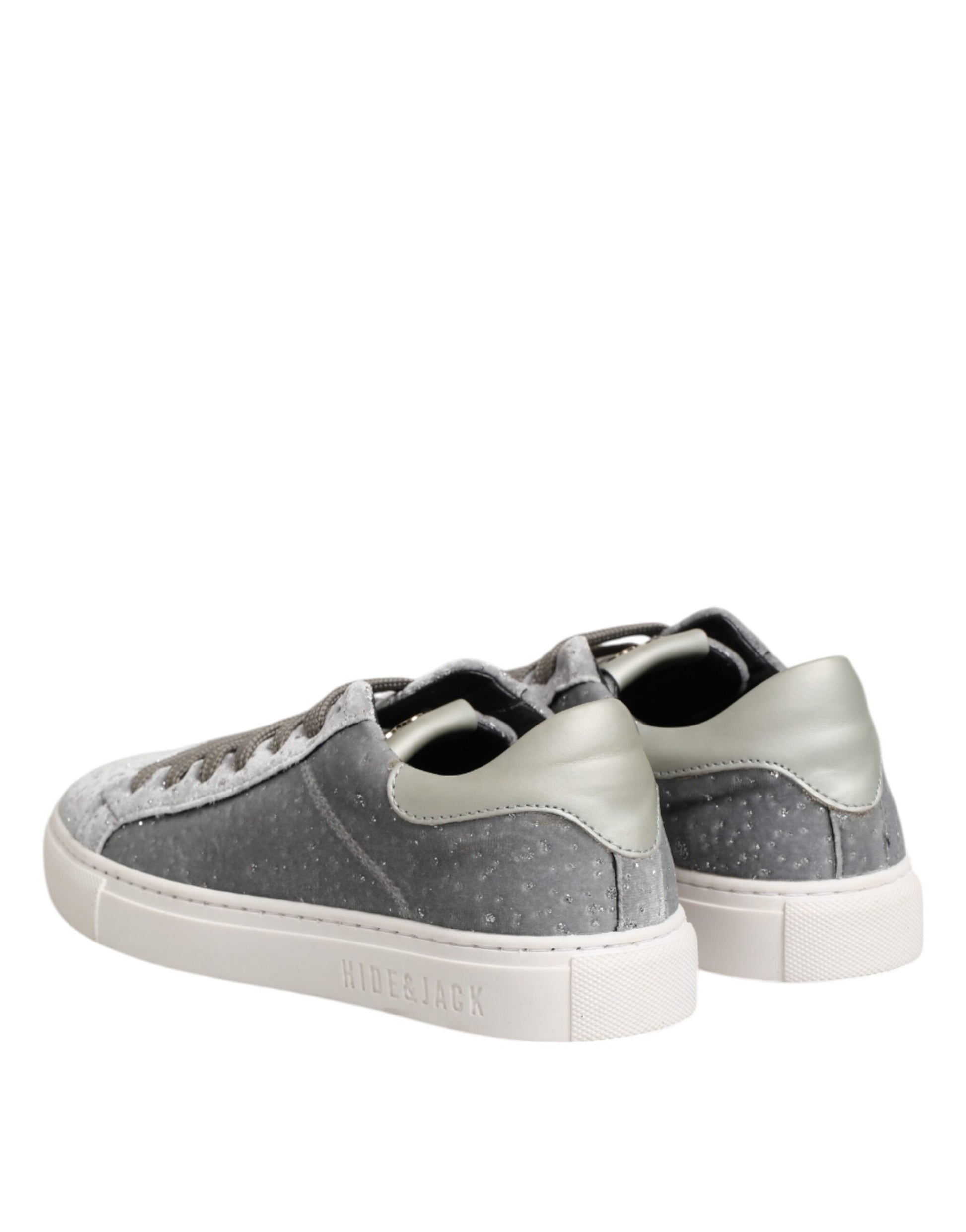 Pair of sneakers with white soles
