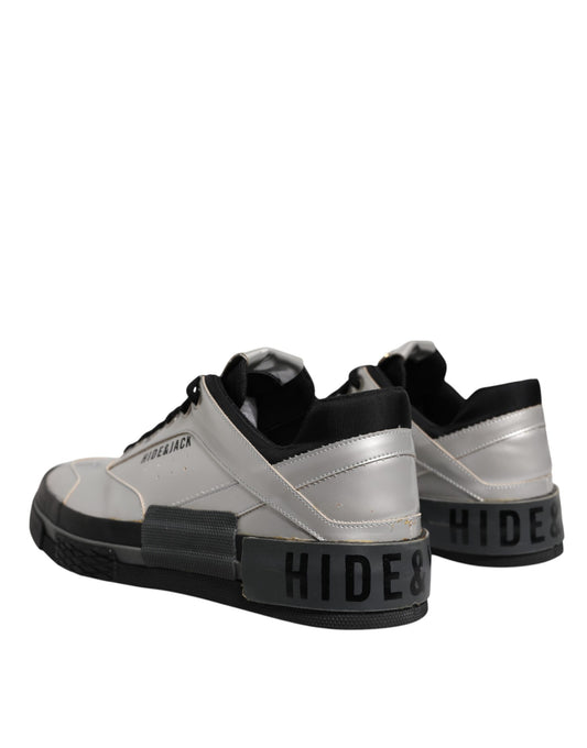 Pair of sneakers with black laces