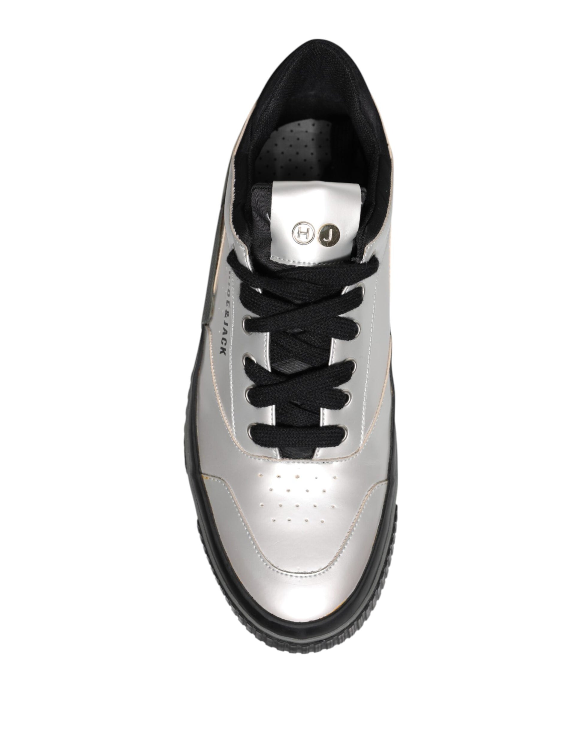 Black and white sneaker with gold accents