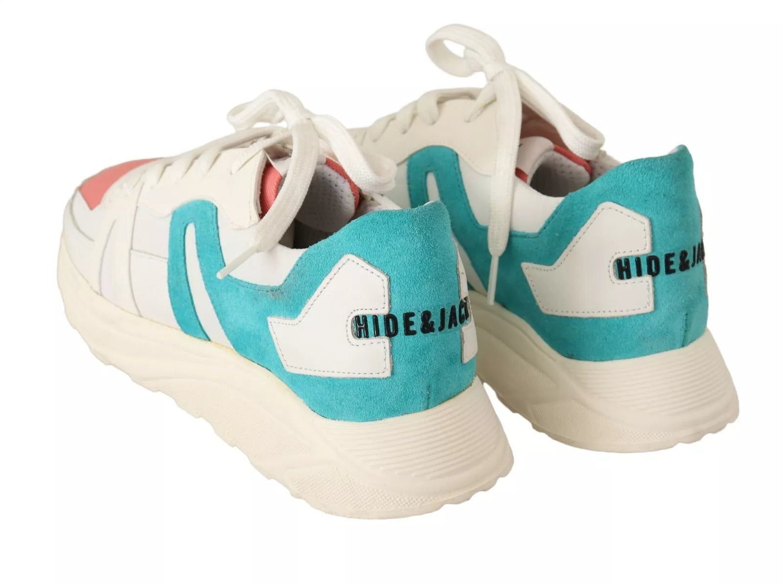 Pair of sneakers with teal and white design