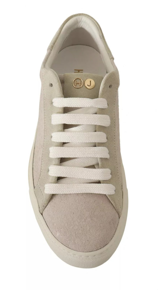 Tan sneaker with white laces