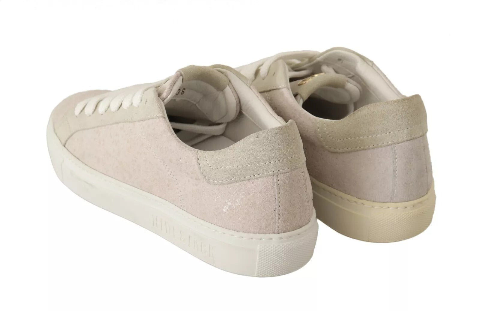 Pair of pink sneakers with white soles