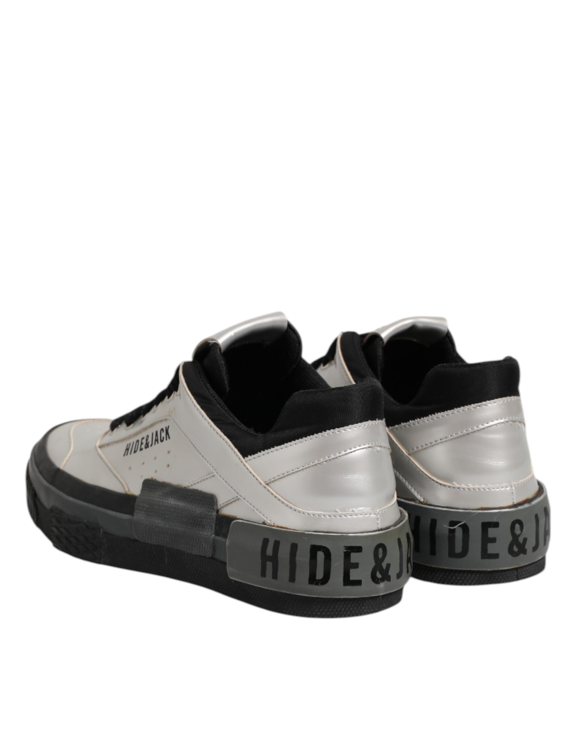 Pair of sneakers with black laces