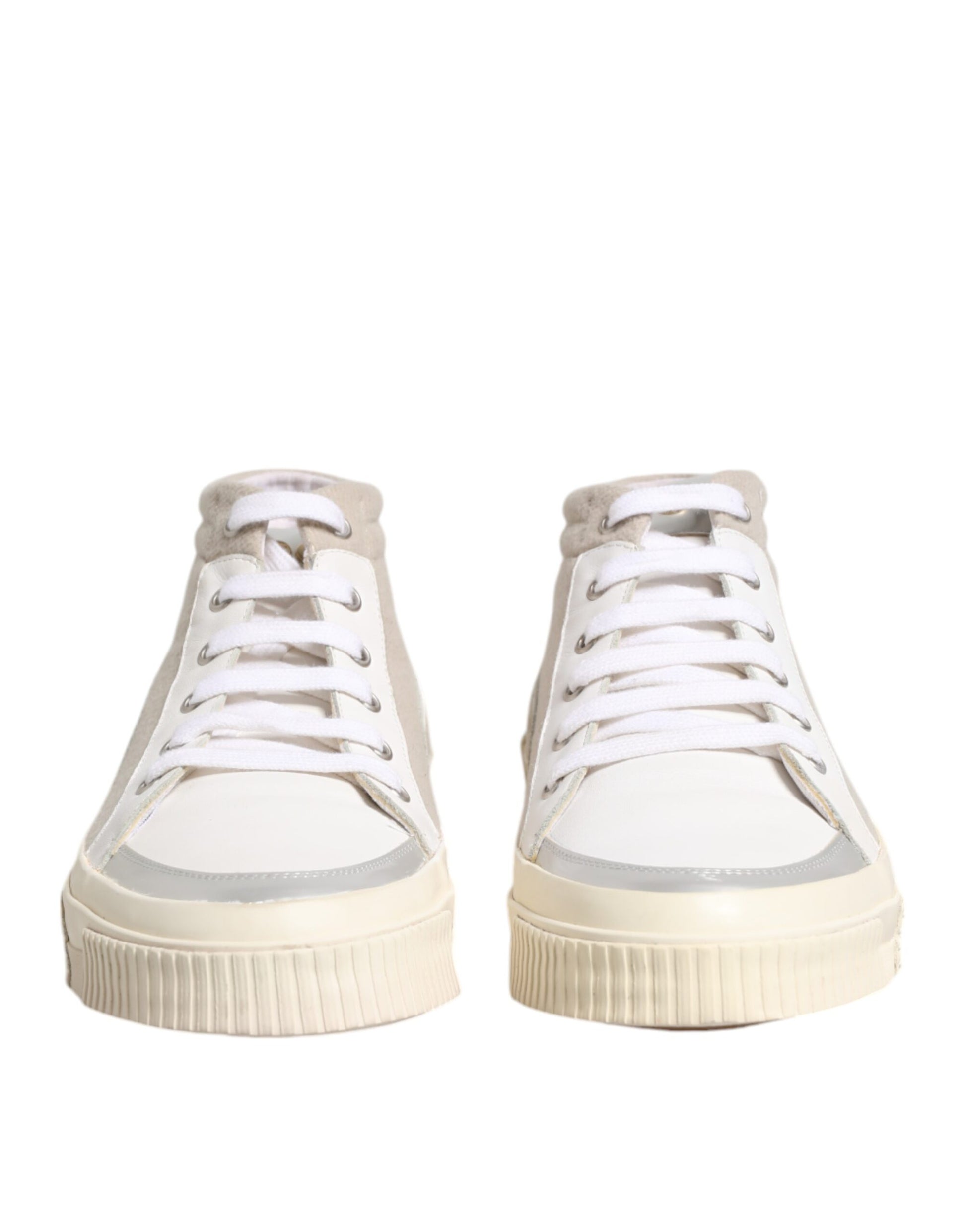 Pair of white sneakers with silver accents