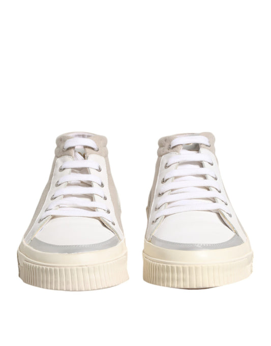 Pair of white sneakers with silver accents