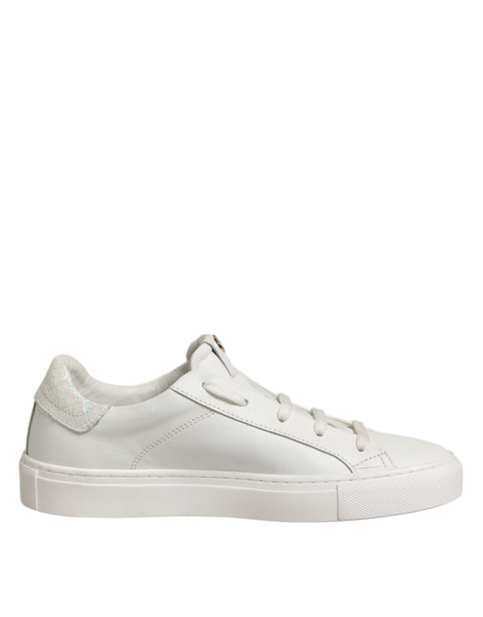 White sneaker with laces and a small bow on top