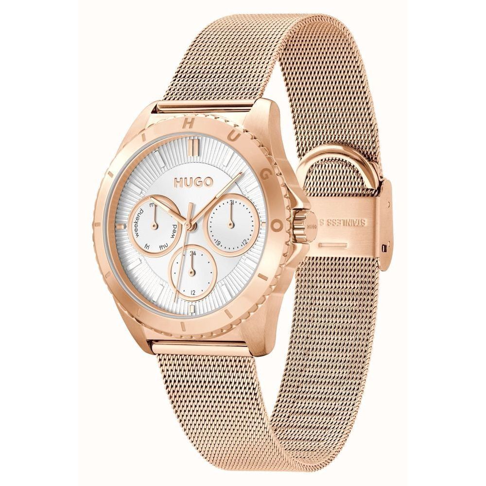 A gold stainless steel watch with a white face, three subdials and date window. The watch has a mesh bracelet and is branded