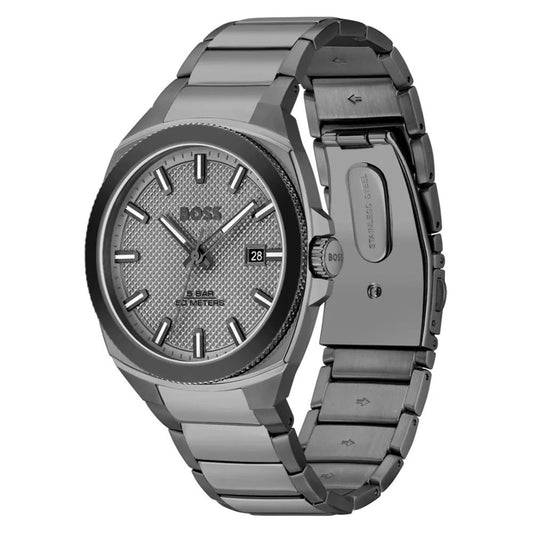 A gray stainless steel watch with a black face, featuring the Hugo Boss logo and date window