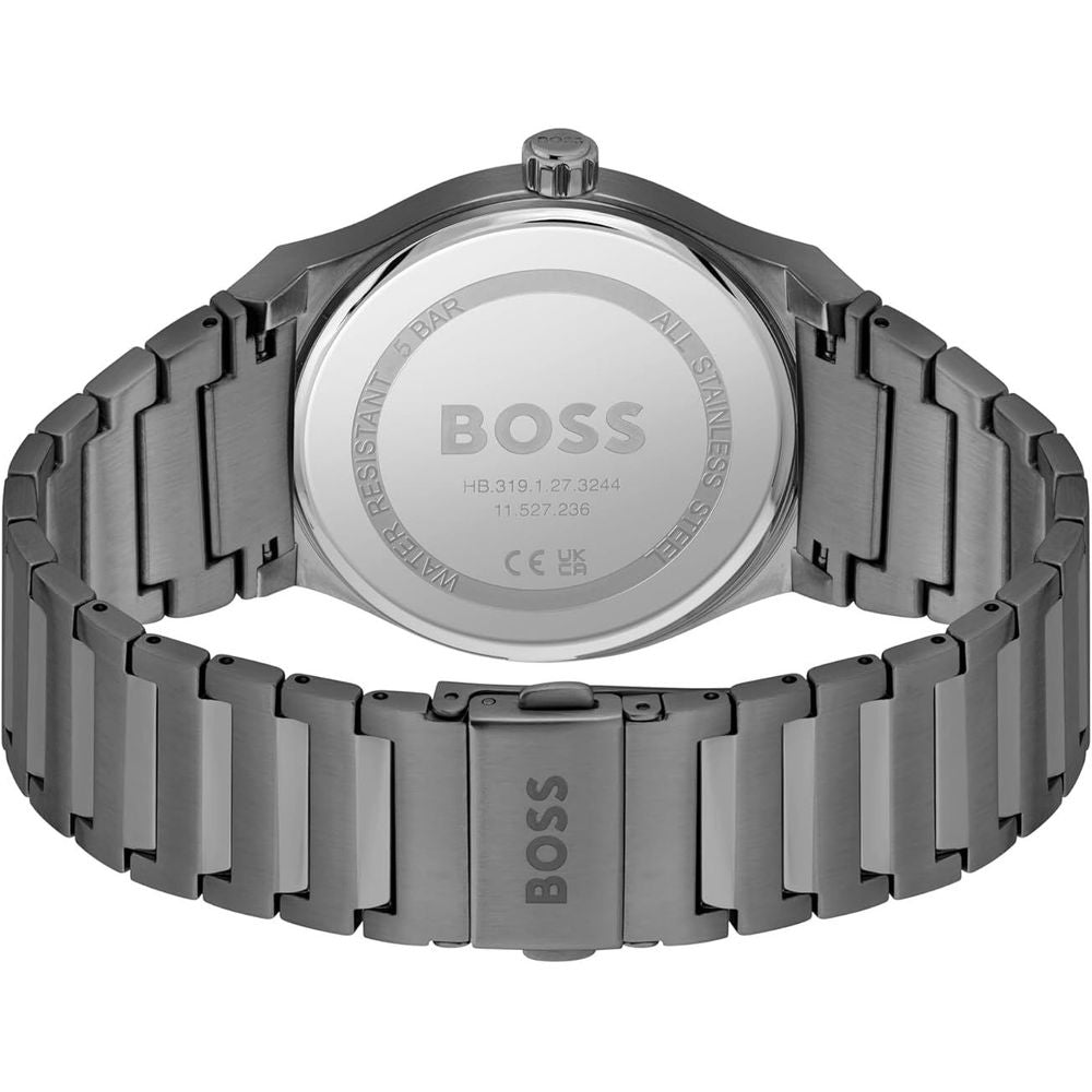 A gray stainless steel watch with a digital display, branded "BOSS" and featuring the Hugo Boss logo