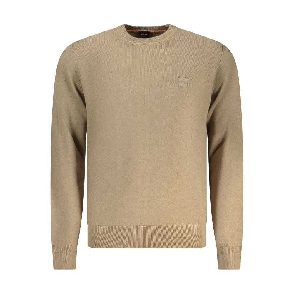 Tan sweater on hanger