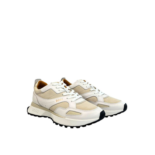 A pair of white leather men's sneakers with tan laces, featuring a logo on the side and a rubber sole
