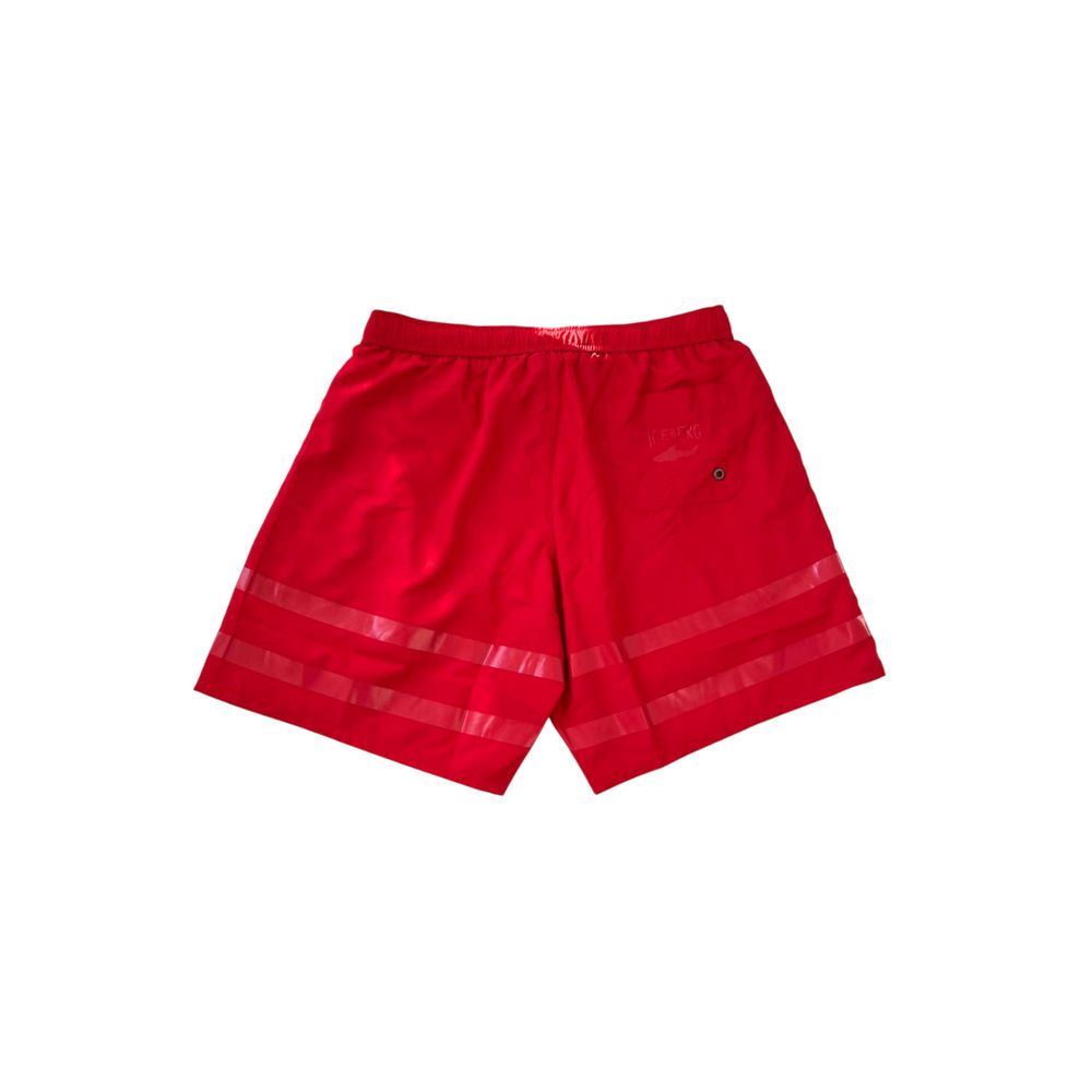 Red swim trunks with white stripe on side