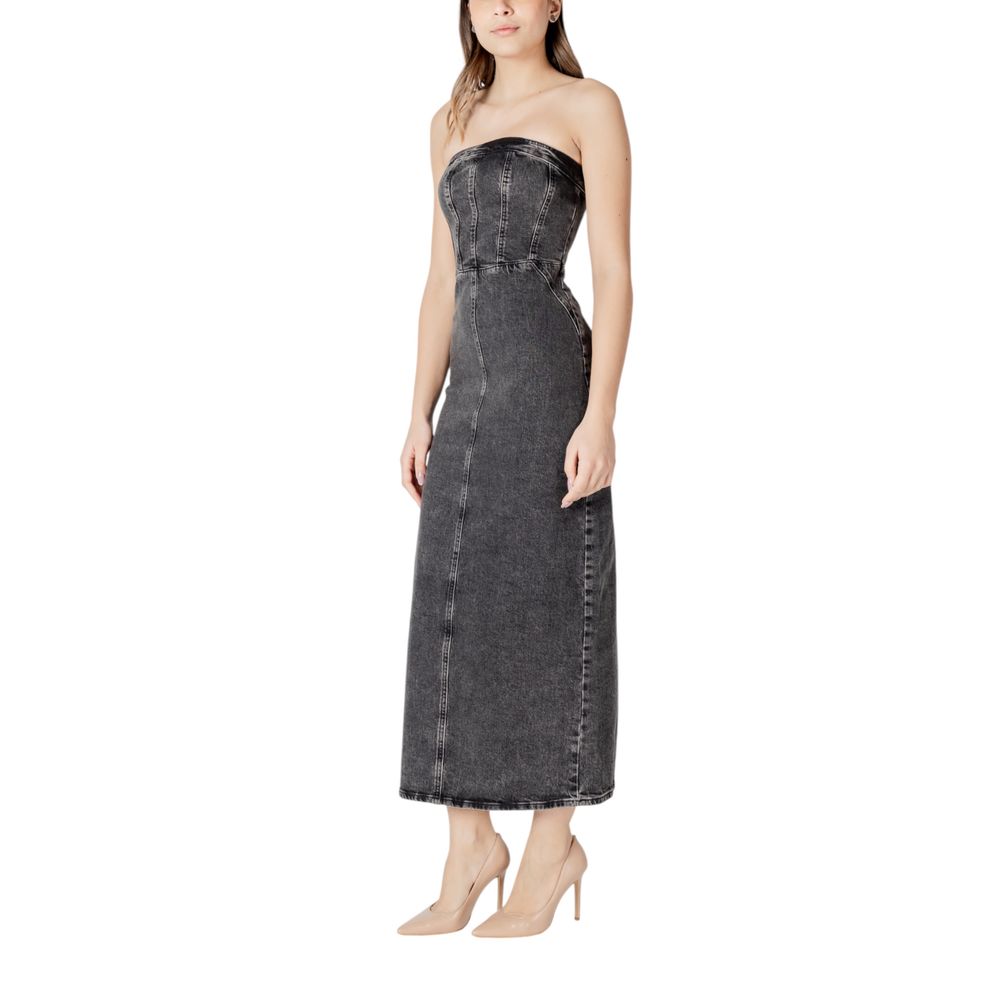 A black midi dress with a fitted bodice and flared skirt, made of denim-like fabric