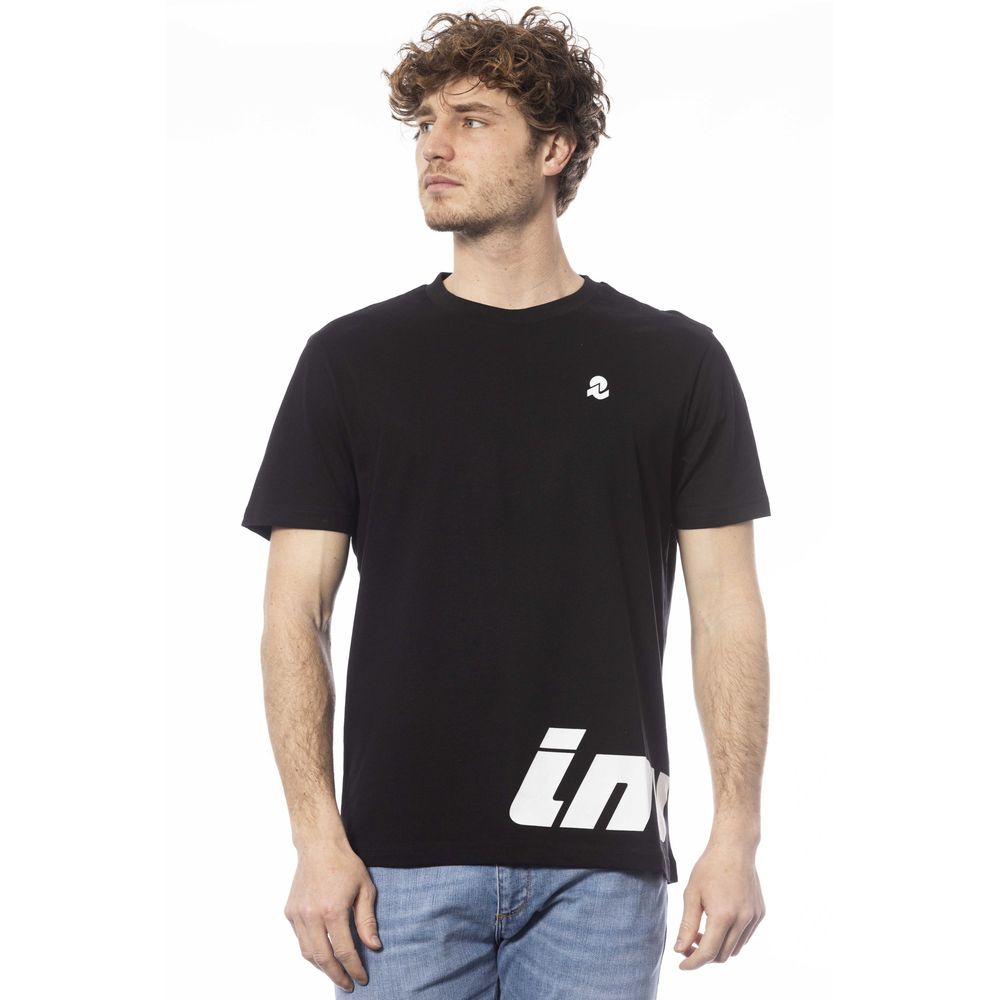 Man wearing black t-shirt with white logo on front