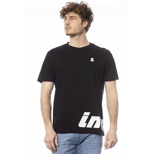 Man wearing black t-shirt with white logo on front
