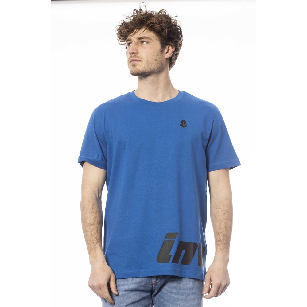 Man wearing blue t-shirt with white logo