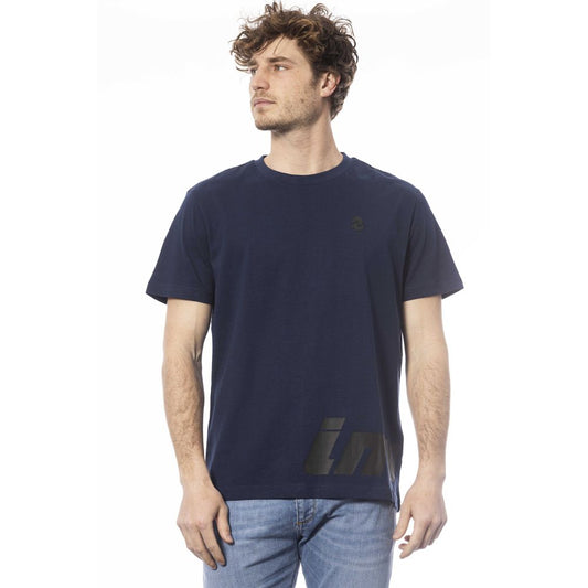 Man wearing dark blue t-shirt with logo on front
