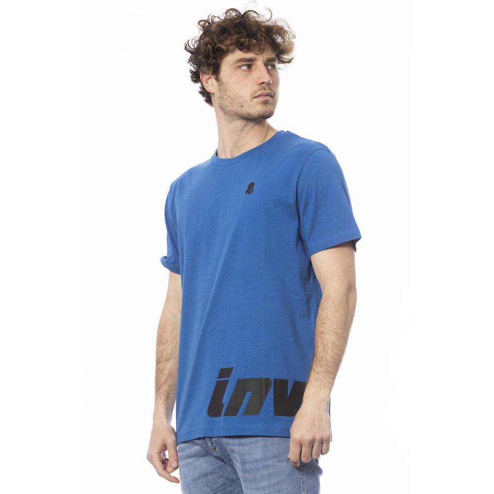 Man wearing blue t-shirt with white logo on front