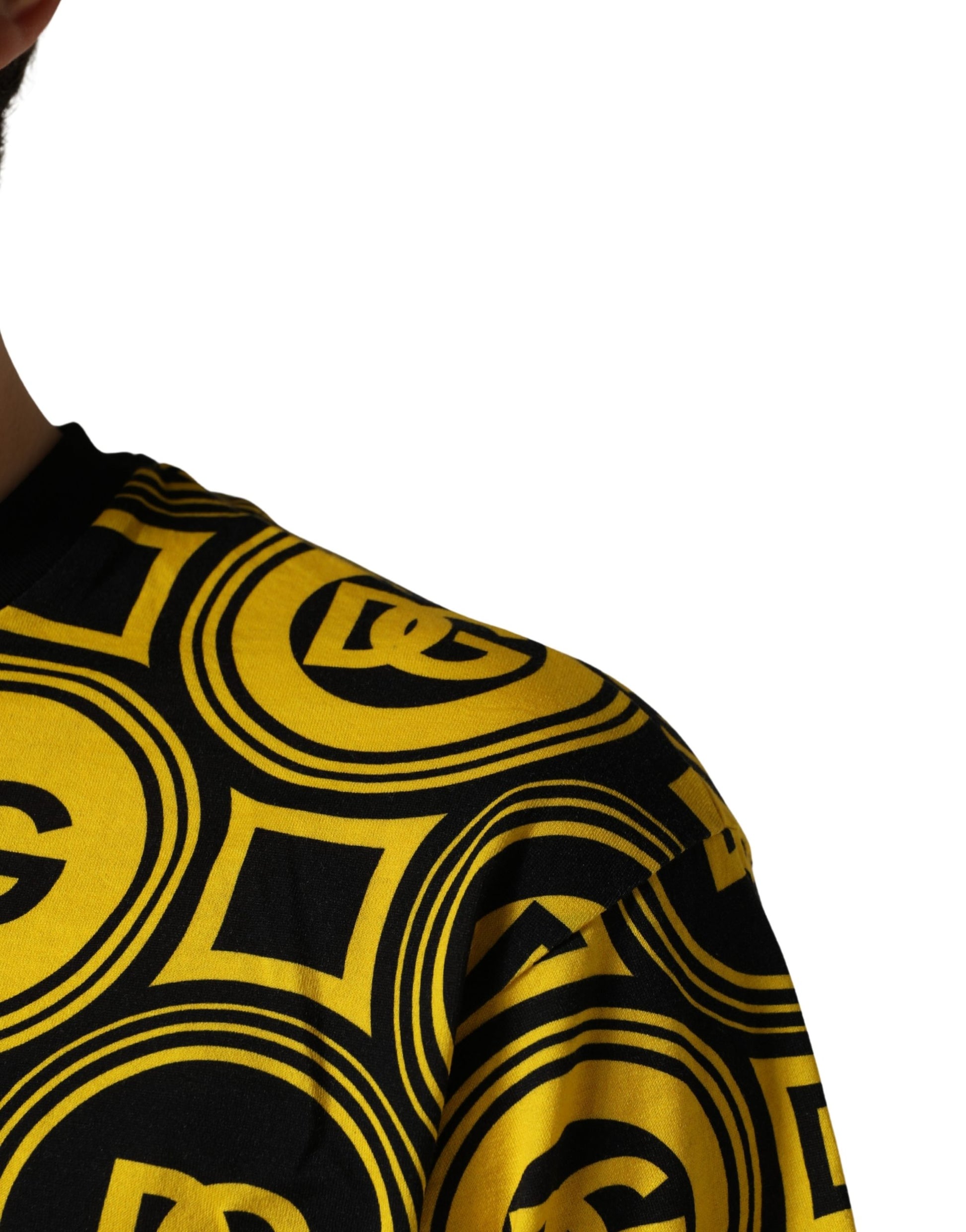 Yellow sweater with black logo