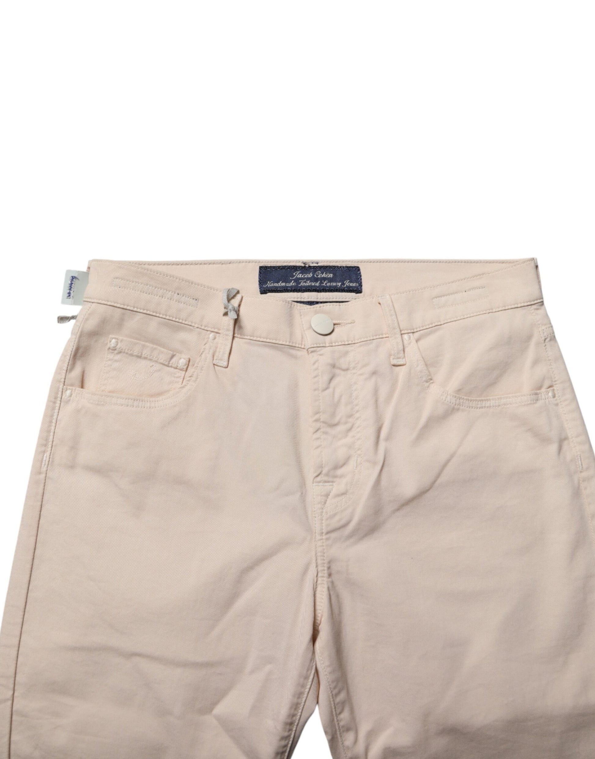 Pair of light beige women's shorts with button closure