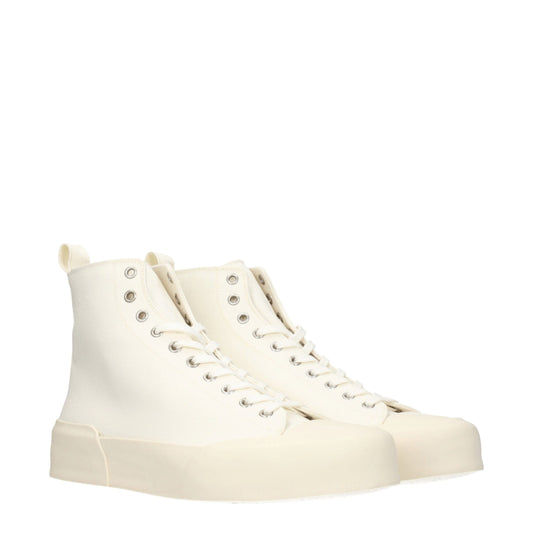 Tan high top sneakers with laces, featuring a chunky sole design