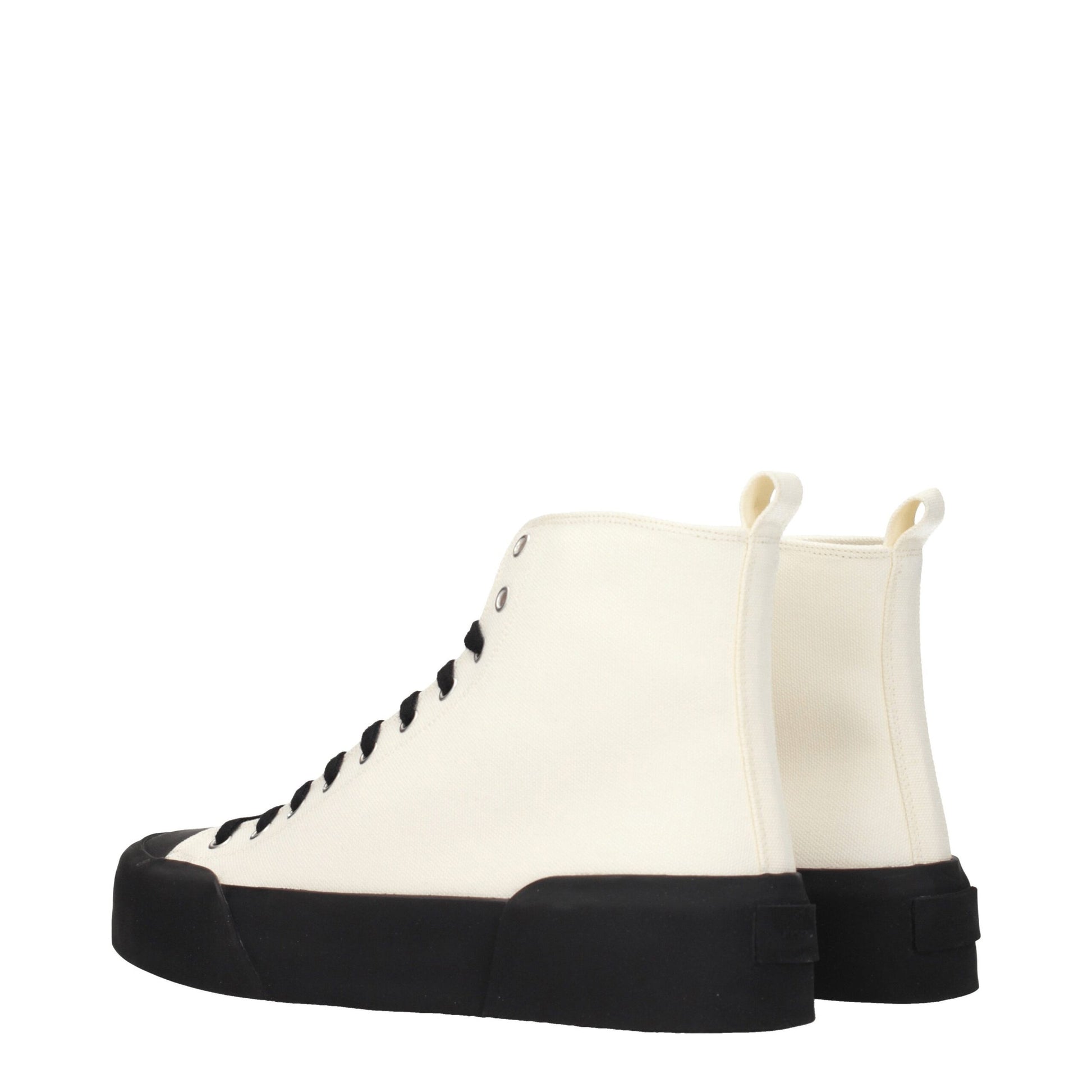 A pair of high top sneakers with a beige fabric upper and black laces