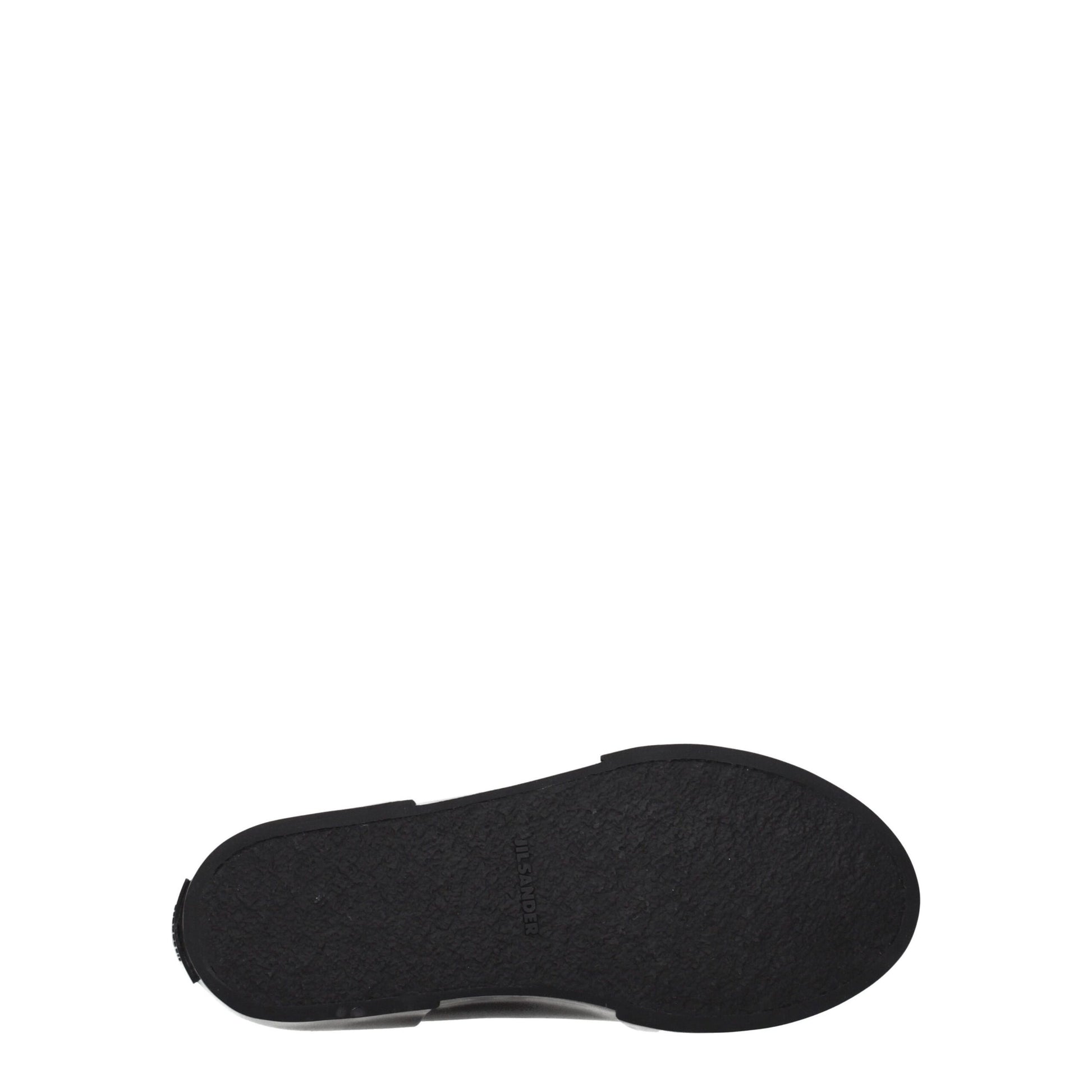 A black high top sneaker with a white sole