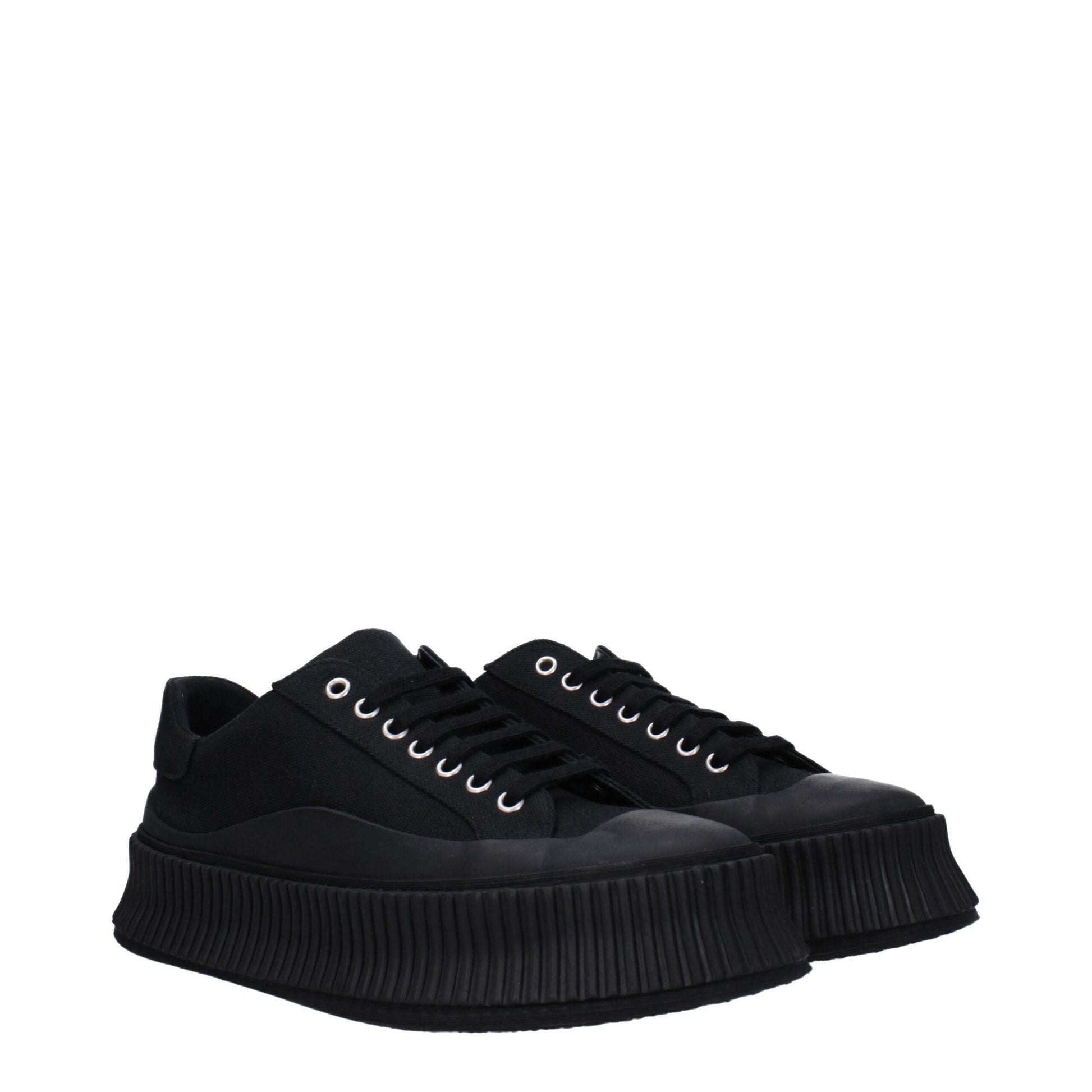A pair of black platform sneakers with a chunky sole, featuring a lace-up front and a low top design