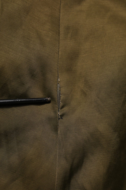 Brown fabric with a hole in it