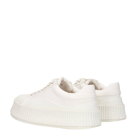 Pair of white platform sneakers with a textured sole