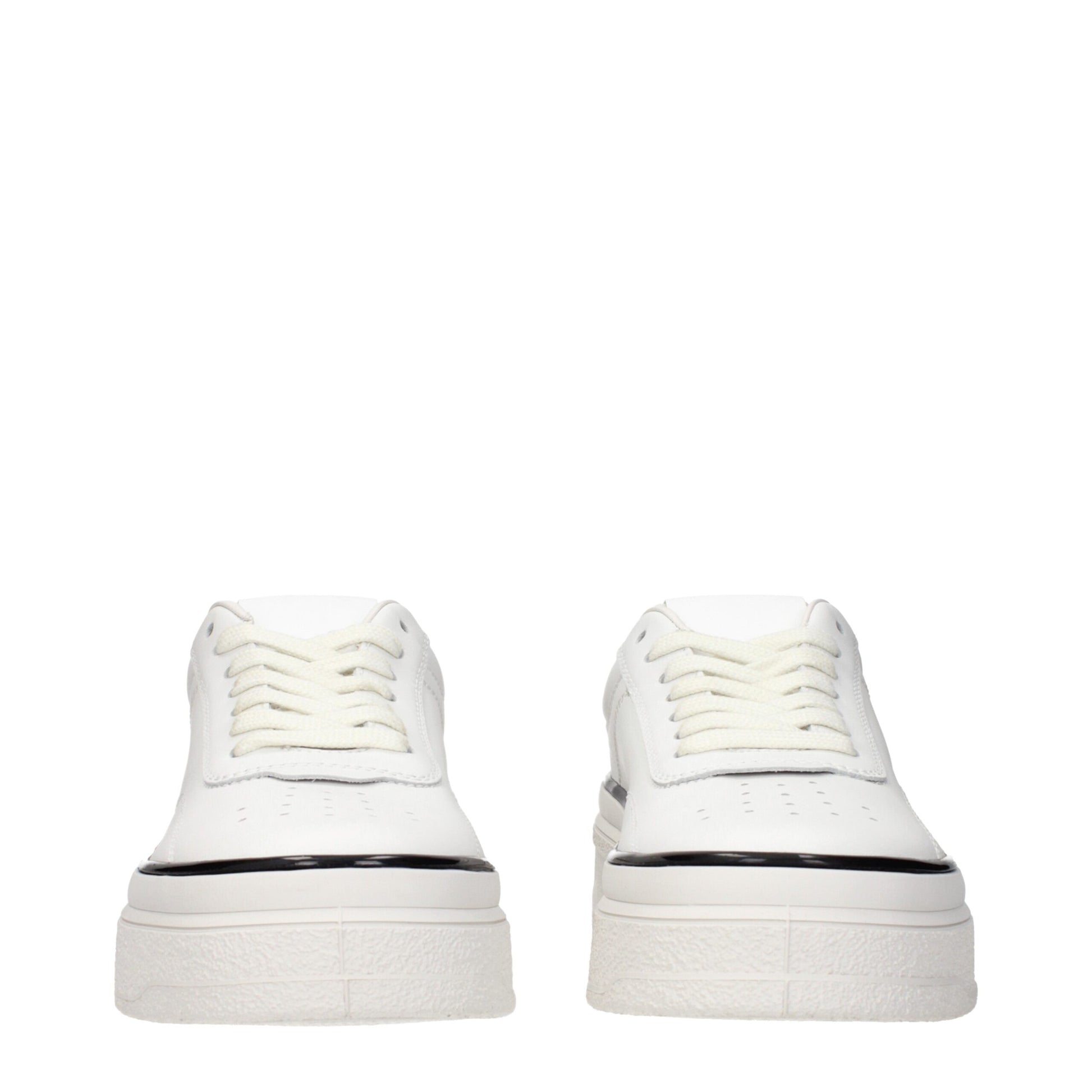 Pair of white leather platform sneakers with black soles, featuring a lace-up design and a low top