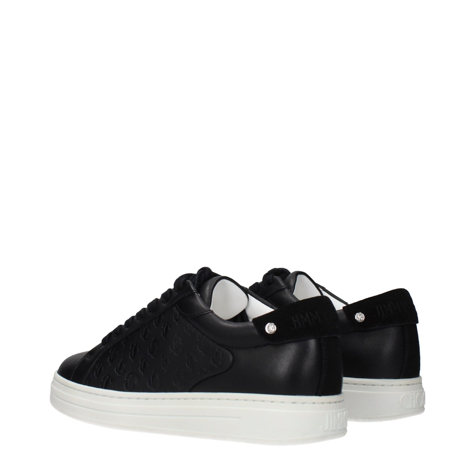 Pair of black leather sneakers with white laces, featuring a textured design on the side and a low top