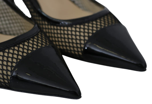 Pair of black high heel shoes with fishnet pattern on toe and heel