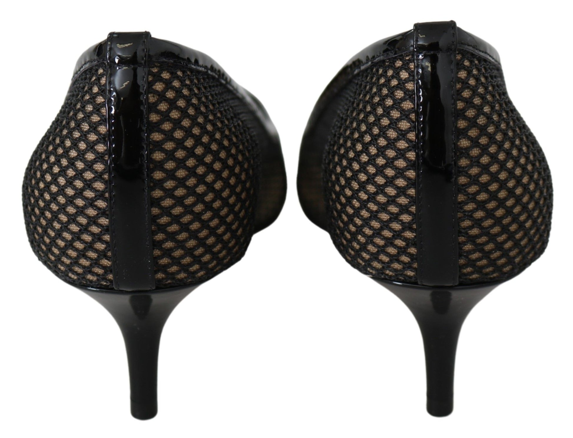 Pair of black high heel shoes with fishnet stockings attached to them